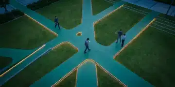 An aerial drone view of an urban park at twilight, with three people walking on interconnected green geometric pathways, illuminated by amber LED strips, symbolizing modern interconnected living.
